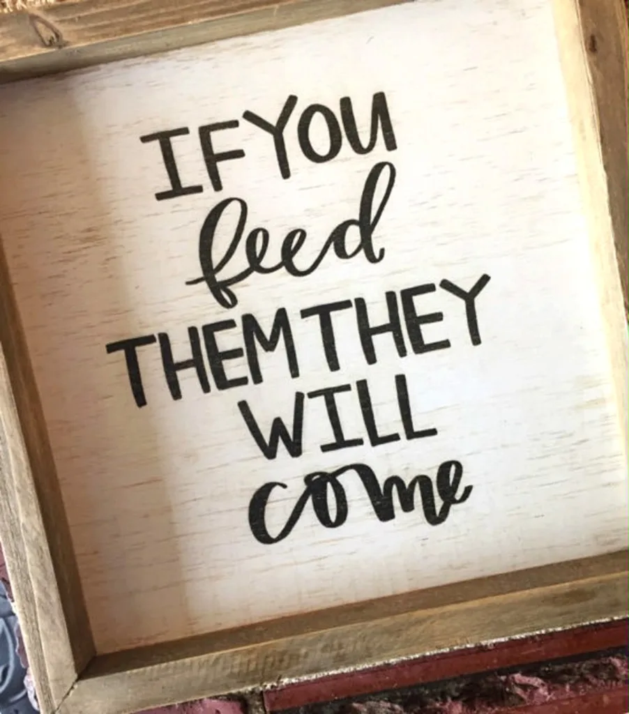 Wooden farmhouse-style kitchen sign reading ‘If you feed them they will come’ — perfect sentiment for family dinner