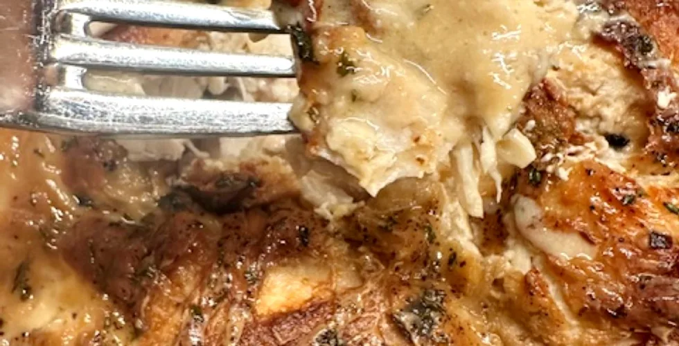 Party chicken – fork-tender chicken wrapped in bacon with creamy mushroom sauce