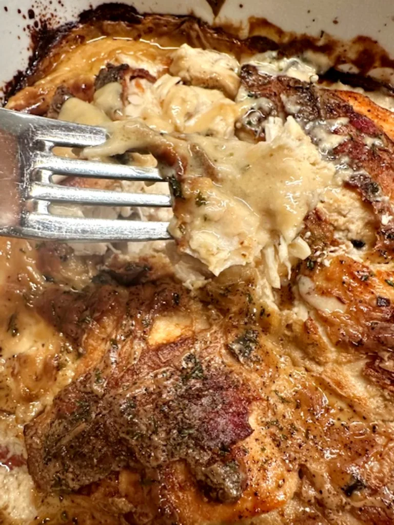 Party Chicken baked with bacon and creamy mushroom sauce