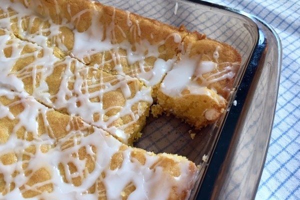 lemon bars with glaze, one bar missing