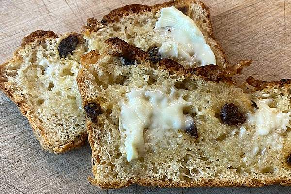 no-knead cinnamon raisin bread with butter