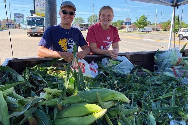 sweet corn stand workers