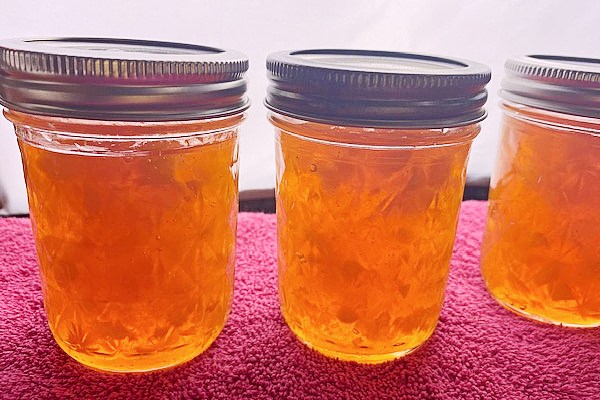 peach jam in jars