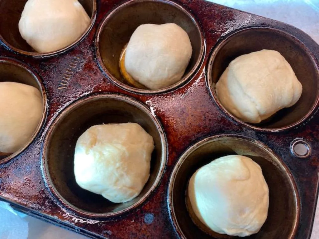 hocus pocus buns in muffin pan