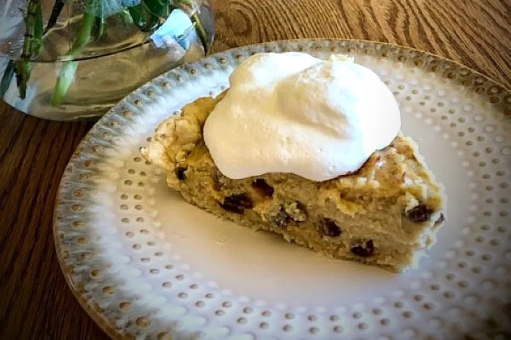 sour cream raisin pie with whipped cream
