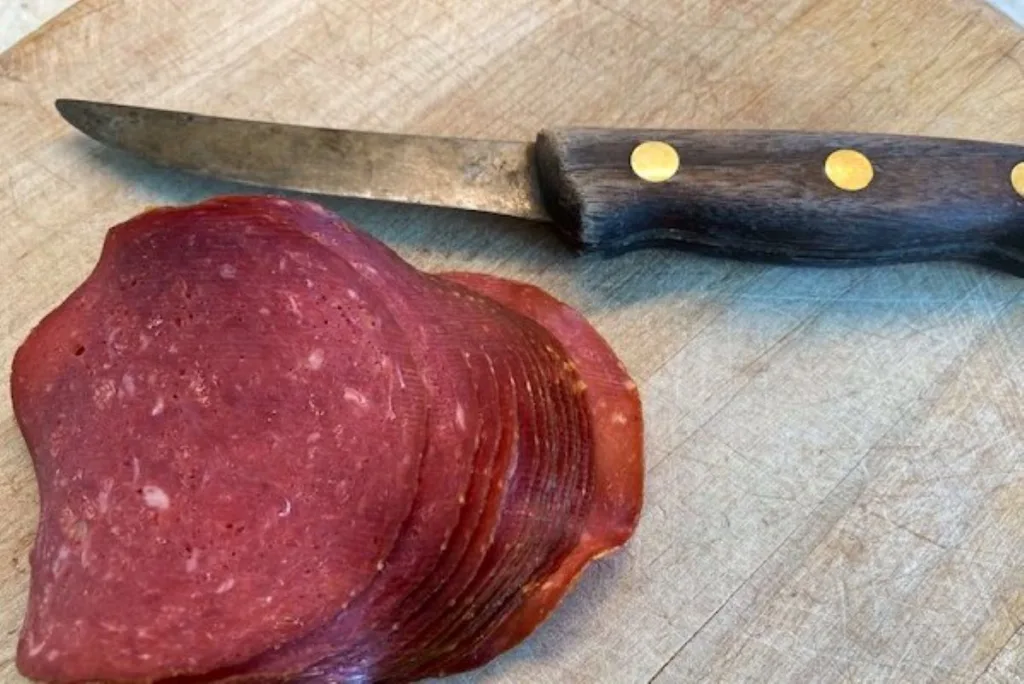 dried beef on a cutting board