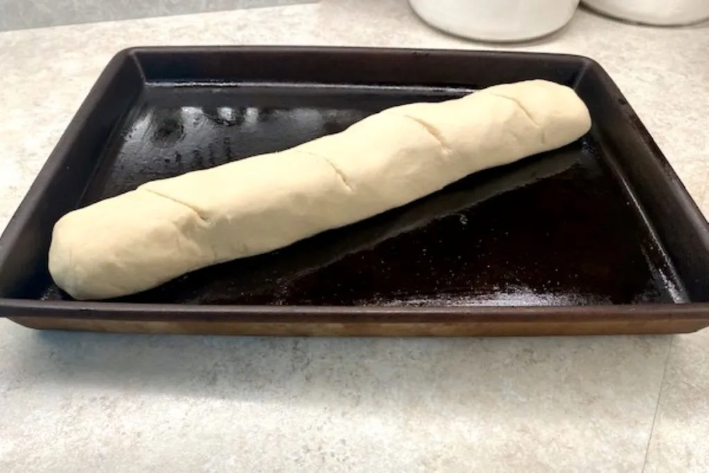 unbaked loaf of quick French bread