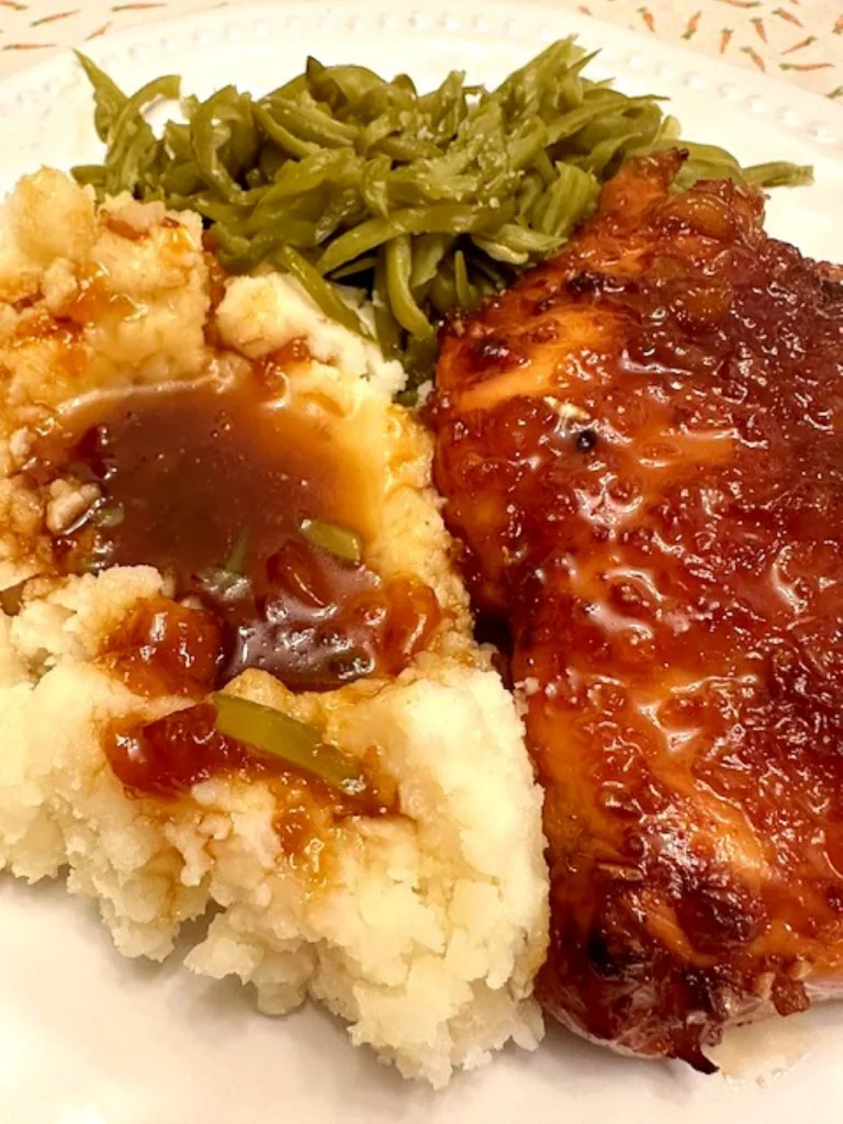 orange marmalade chicken served with mashed potatoes and French-cut green beans